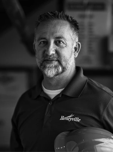 Warehouse Worker Holding Hard Hat